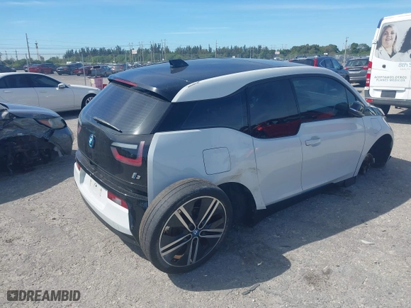 2017 BMW i3 with VIN WBY1Z8C32HV891355, listed as a IAAI auction lot 41723555 with 77,773 mi miles. Bid and sale history available at carsss.com. Image 4.