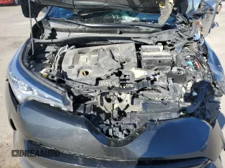 2019 Toyota C-HR XLE z VIN JTNKHMBX0K1040753, wystawiony jako Copart lot #52370615 z przebiegiem 120 056 mil mil oraz Szkoda całkowita • Salvage title. Historia ofert i sprzedaży dostępna na DreamBid. Obrazek 13.