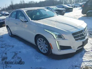 2014 Cadillac CTS Luxury RWD with VIN 1G6AR5SXXE0141931, listed as a IAAI auction lot 41352385 with 162,612 mi miles. Bid and sale history available at carsss.com. Image 1.