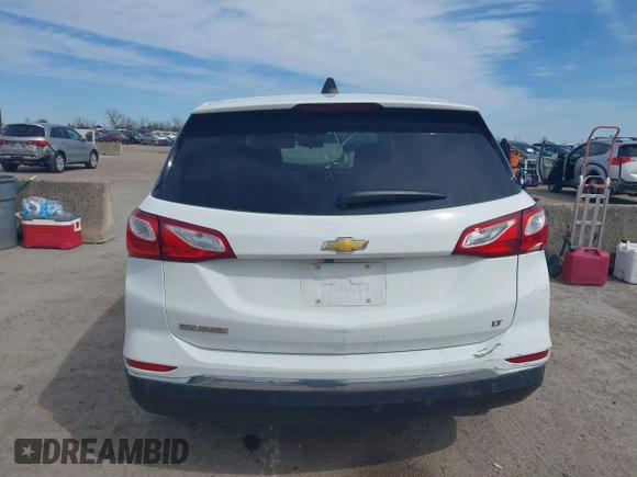 2019 Chevrolet Equinox LT z VIN 2GNAXKEVXK6256700, wystawiony jako IAAI lot #41655963 z przebiegiem 80 294 mil mil oraz . Historia ofert i sprzedaży dostępna na DreamBid. Obrazek 17.