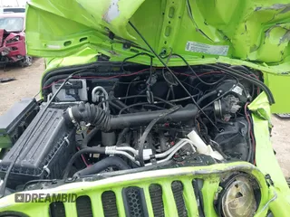 2004 Jeep Wrangler Sahara z VIN 1J4FA59S44P704878, wystawiony jako IAAI lot #42226255 z przebiegiem 88 886 mil mil oraz . Historia ofert i sprzedaży dostępna na DreamBid. Obrazek 10.