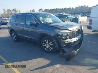 2017 Honda Pilot EX-L with VIN 5FNYF5H58HB011940, listed as a IAAI auction lot 41793151 with 118,088 mi miles. Bid and sale history available at carsss.com. Image 1.