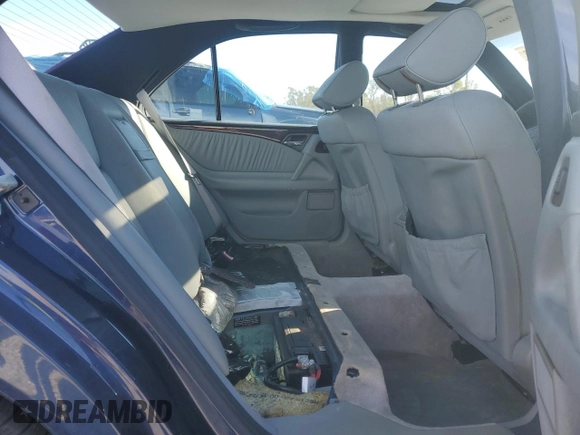 1998 Mercedes-Benz E-Class with VIN WDBJF65F3WA642006, listed as a Copart auction lot 87309994 with 129,837 mi miles and Salvage Title. Bid and sale history available at carsss.com. Image 10.