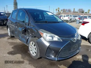 2015 Toyota Yaris L with VIN VNKKTUD34FA022251, listed as a IAAI auction lot 41435973 with 57,044 mi miles. Bid and sale history available at carsss.com. Image 1.