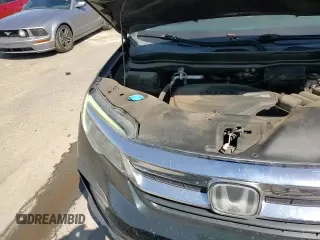 2019 Honda Pilot EX-L z VIN 5FNYF6H5XKB049280, wystawiony jako Copart lot #72039605 z przebiegiem 92 741 mil mil oraz Szkoda całkowita • Salvage title. Historia ofert i sprzedaży dostępna na DreamBid. Obrazek 15.