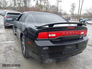 2013 Dodge Charger RT Max with VIN 2C3CDXCT1DH711065, listed as a IAAI auction lot 41512711 with 163,738 mi miles. Bid and sale history available at carsss.com. Image 3.
