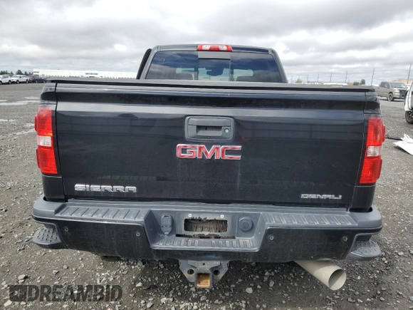2017 GMC Sierra 2500HD Denali z VIN 1GT12UEY0HF114366, wystawiony jako Copart lot #54540275 z przebiegiem 78 066 mil mil oraz Szkoda całkowita • Salvage title. Historia ofert i sprzedaży dostępna na DreamBid. Obrazek 6.