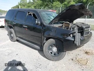 2013 Chevrolet Tahoe Commercial z VIN 1GNLC2E00DR265941, wystawiony jako IAAI lot #42289977 z przebiegiem 206 840 mil mil oraz . Historia ofert i sprzedaży dostępna na DreamBid. Obrazek 1.