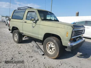 1987 Ford Bronco z VIN 1FMCU14T6HUC98971, wystawiony jako Copart lot #69262784 z przebiegiem 49 522 mil mil oraz Czysty tytuł • Clean title. Historia ofert i sprzedaży dostępna na DreamBid. Obrazek 4.