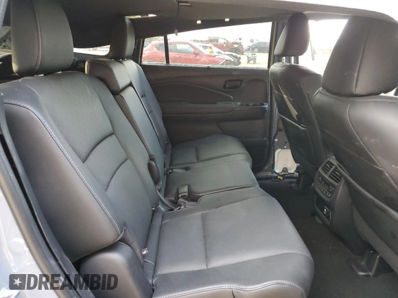 2022 Honda Passport Elite z VIN 5FNYF8H01NB002305, wystawiony jako Copart lot #49740525 z przebiegiem 37 134 mil mil oraz Szkoda całkowita • Salvage title. Historia ofert i sprzedaży dostępna na DreamBid. Obrazek 11.