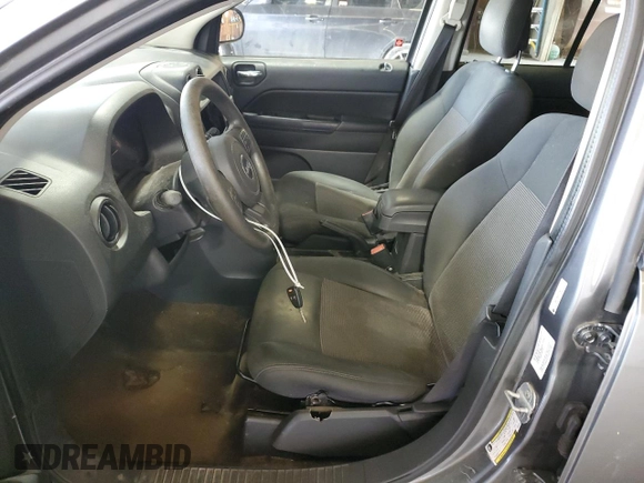 2014 Jeep Compass Sport with VIN 1C4NJDBB6ED592223, listed as a Copart auction lot 63343984 with 124,942 mi miles and Clean Title. Bid and sale history available at carsss.com. Image 7.