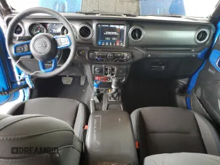 2023 Jeep Wrangler Rubicon with VIN 1C4JJXR69PW581362, listed as a Copart auction lot 58557795 with 34,357 mi miles and Salvage title. Bid and sale history available at DreamBid. Image 8.