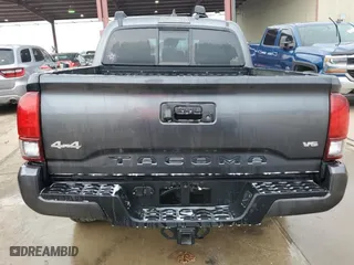 2023 Toyota Tacoma 4WD SR with VIN 3TMCZ5AN5PM560517, listed as a Copart auction lot 50228785 with 9,964 mi miles and Clean Title. Bid and sale history available at carsss.com. Image 6.