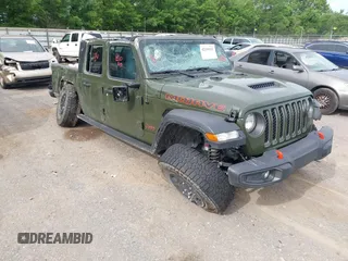 2023 Jeep Gladiator Mojave z VIN 1C6JJTEG5PL536662, wystawiony jako IAAI lot #42319301 z przebiegiem 29 729 mil mil oraz . Historia ofert i sprzedaży dostępna na DreamBid. Obrazek 1.