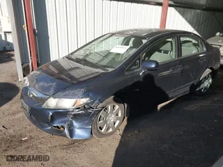 2009 Honda Civic Sdn LX with VIN 2HGFA16559H544472, listed as a IAAI auction lot 41695513 with 124,845 mi miles. Bid and sale history available at carsss.com. Image 17.