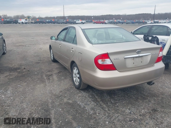 2003 Toyota Camry LE with VIN 4T1BE30K73U248560, listed as a IAAI auction lot 41889516 with 179,961 mi miles and . Bid and sale history available at DreamBid. Image 3.