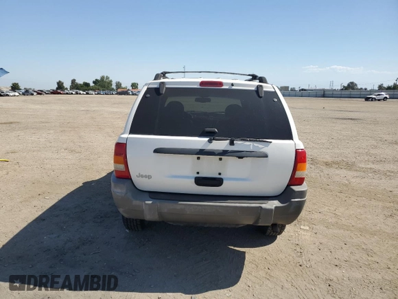 1999 Jeep Grand Cherokee Laredo с VIN 1J4G258S8XC735159, выставлен на аукционе Copart как лот 56247505 с пробегом 241 636 миль миль и Списание • Salvage title. История ставок и продаж доступна на DreamBid. Изображение 6.
