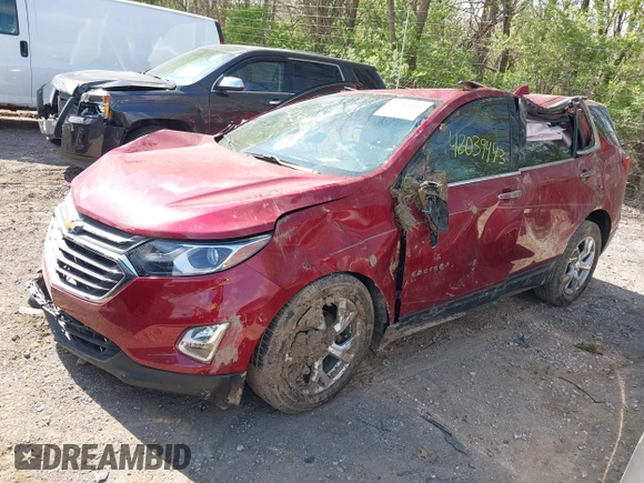 2021 Chevrolet Equinox Premier z VIN 2GNAXNEV7M6140889, wystawiony jako IAAI lot #42039443 z przebiegiem 101 767 mil mil oraz . Historia ofert i sprzedaży dostępna na DreamBid. Obrazek 2.