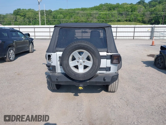 2012 Jeep Wrangler Sport z VIN 1C4AJWAG9CL255278, wystawiony jako IAAI lot #42469091 z przebiegiem 140 480 mil mil oraz . Historia ofert i sprzedaży dostępna na DreamBid. Obrazek 17.