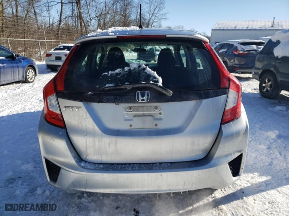 2015 Honda Fit LX with VIN 3HGGK5H59FM755418, listed as a Copart auction lot 85170334 with 76,663 mi miles and Salvage Title. Bid and sale history available at carsss.com. Image 6.