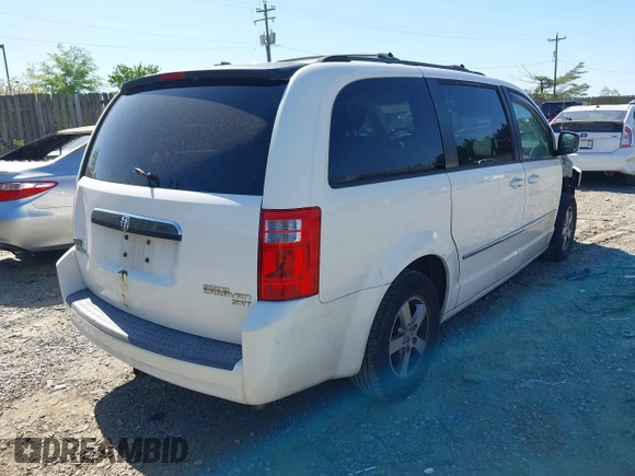2010 Dodge Grand Caravan SXT with VIN 2D4RN5D12AR210330, listed as a IAAI auction lot 42146969 with 233,607 mi miles and . Bid and sale history available at DreamBid. Image 4.