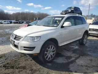 2010 Volkswagen Touareg VR6 with VIN WVGBF7A92AD003436, listed as a Copart auction lot 87545585 with 145,716 mi miles and Clean Title. Bid and sale history available at DreamBid. Image 1.