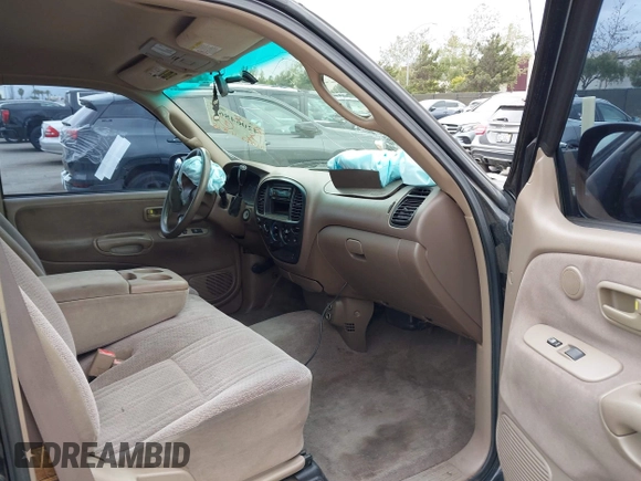 2001 Toyota Tundra SR5 with VIN 5TBRT34181S197753, listed as a IAAI auction lot 42064862 with 261,523 mi miles. Bid and sale history available at carsss.com. Image 5.