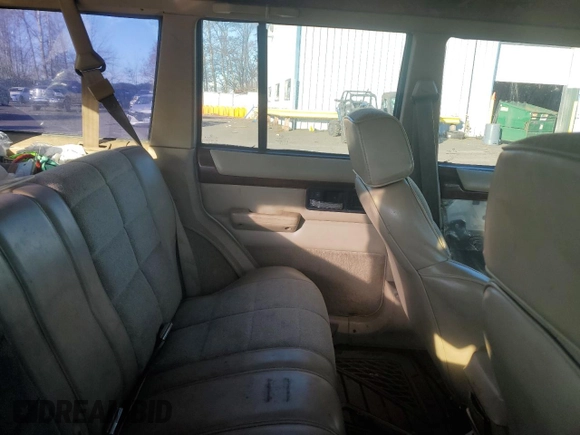 1993 Jeep Cherokee Country with VIN 1J4FJ78S0PL565292, listed as a Copart auction lot 83214974 with 233,925 mi miles and Clean Title. Bid and sale history available at carsss.com. Image 10.