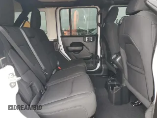 2023 Jeep Wrangler Sport S with VIN 1C4HJXDN3PW522353, listed as a Copart auction lot 86645234 with 17,562 mi miles and Salvage Title. Bid and sale history available at DreamBid. Image 11.