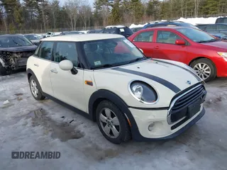 2019 MINI Hardtop 4 Door Cooper with VIN WMWXU1C5XK2J02152, listed as a IAAI auction lot 41527088 with 68,957 mi miles and . Bid and sale history available at DreamBid. Image 1.