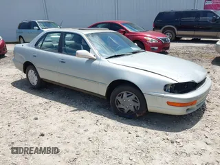 1994 Toyota Camry LE z VIN 4T1SK12EXRU374909, wystawiony jako IAAI lot #42198961 z przebiegiem 269 871 mil mil oraz . Historia ofert i sprzedaży dostępna na DreamBid. Obrazek 1.