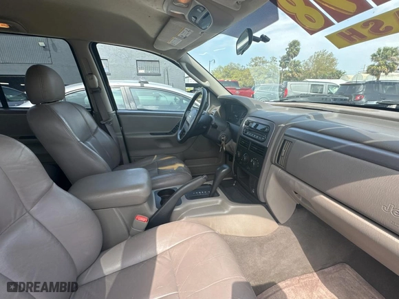 2004 Jeep Grand Cherokee Laredo with VIN 1J4GX48N24C436753, listed as a Copart auction lot 48782585 with 114,035 mi miles and Clean Title. Bid and sale history available at carsss.com. Image 5.