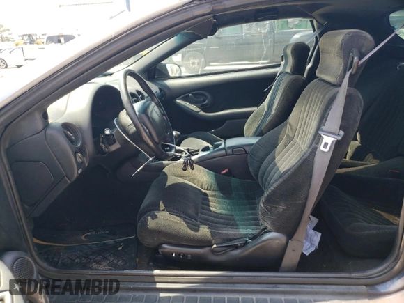 2002 Pontiac Firebird Firebird z VIN 2G2FS22K722143614, wystawiony jako Copart lot #48345535 z przebiegiem 100 664 mil mil oraz Szkoda całkowita • Salvage title. Historia ofert i sprzedaży dostępna na DreamBid. Obrazek 7.