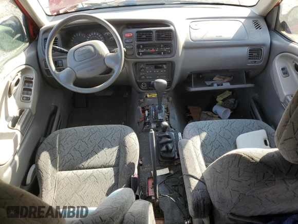 2004 Chevrolet Tracker ZR2 z VIN 2CNBJ734X46910549, wystawiony jako Copart lot #80849894 z przebiegiem Nie podano mil oraz Szkoda całkowita • Salvage title. Historia ofert i sprzedaży dostępna na DreamBid. Obrazek 8.