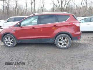 2015 Ford Escape Titanium with VIN 1FMCU9JX1FUA56091, listed as a IAAI auction lot 41947035 with 191,297 mi miles and . Bid and sale history available at DreamBid. Image 14.