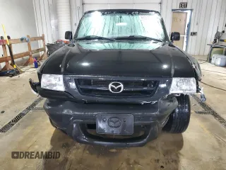 2002 Mazda B-Series 2WD Truck SX with VIN 4F4YR12D02TM00986, listed as a Copart auction lot 88323825 with 124,186 mi miles and Salvage Title. Bid and sale history available at carsss.com. Image 5.