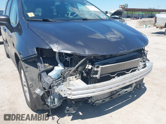 2020 Chrysler Voyager LX z VIN 2C4RC1CG2LR131258, wystawiony jako IAAI lot #42237185 z przebiegiem 138 945 mil mil oraz . Historia ofert i sprzedaży dostępna na DreamBid. Obrazek 6.