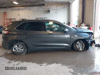 2015 Ford Edge SEL with VIN 2FMTK3J80FBB24088, listed as a IAAI auction lot 41724786 with 101,066 mi miles. Bid and sale history available at carsss.com. Image 13.
