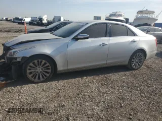2014 Cadillac CTS Luxury AWD with VIN 1G6AX5SX9E0141473, listed as a Copart auction lot 49163265 with 142,361 mi miles and Salvage Title. Bid and sale history available at DreamBid. Image 1.
