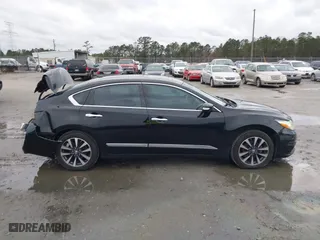 2016 Nissan Altima 2.5 SL with VIN 1N4AL3AP4GC161524, listed as a IAAI auction lot 41317383 with 144,810 mi miles. Bid and sale history available at carsss.com. Image 13.