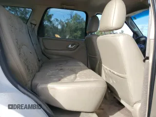 2006 Mazda Tribute S with VIN 4F2YZ06116KM28522, listed as a Copart auction lot 83670154 with Not Provided miles and Non Repairable. Bid and sale history available at carsss.com. Image 11.