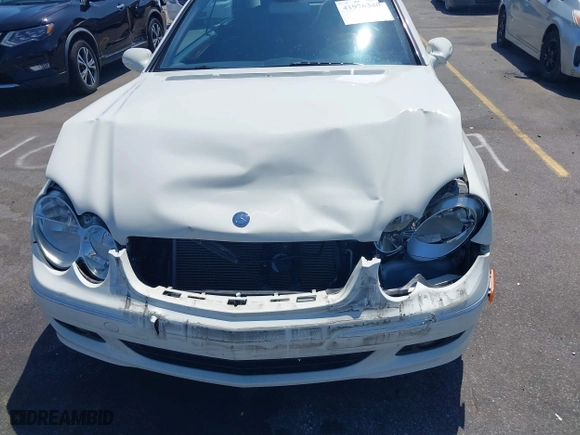 2009 Mercedes-Benz CLK-Class 3.5L with VIN WDBTK56F09T104434, listed as a IAAI auction lot 41976340 with 58,710 mi miles. Bid and sale history available at carsss.com. Image 6.