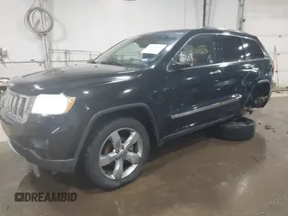 2013 Jeep Grand Cherokee Overland with VIN 1C4RJECT4DC526465, listed as a IAAI auction lot 41570663 with 116,948 mi miles. Bid and sale history available at carsss.com. Image 17.