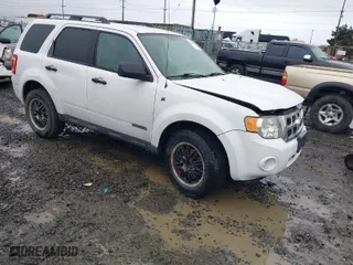 2008 Ford Escape Hybrid with VIN 1FMCU49H68KD21490, listed as a IAAI auction lot 41589534 with 161,458 mi miles. Bid and sale history available at carsss.com. Image 1.