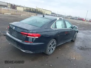 2021 Volkswagen Passat SE z VIN 1VWSA7A36MC014185, wystawiony jako IAAI lot #41915701 z przebiegiem 175 043 mil mil oraz . Historia ofert i sprzedaży dostępna na DreamBid. Obrazek 4.