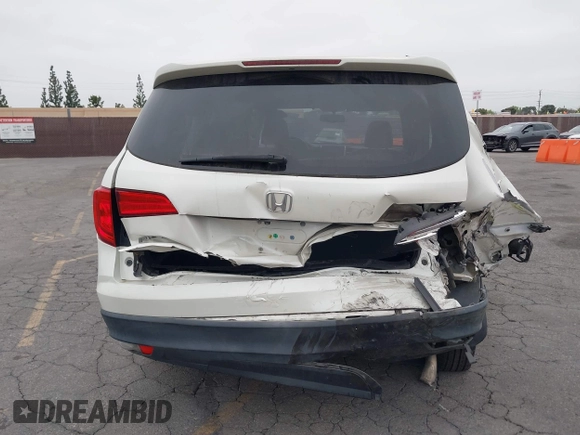 2016 Honda Pilot EX-L with VIN 5FNYF5H54GB037742, listed as a IAAI auction lot 41988112 with 68,459 mi miles and . Bid and sale history available at DreamBid. Image 16.