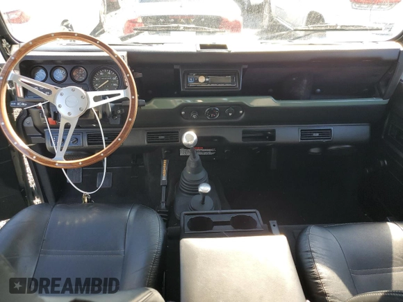1992 Land Rover Defender with VIN SALLDVAF8JA917701, listed as a Copart auction lot 73864824 with 4,284 mi miles and Salvage title. Bid and sale history available at DreamBid. Image 8.