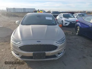 2017 Ford Fusion Titanium z VIN 3FA6P0SU5HR373140, wystawiony jako IAAI lot #41082406 z przebiegiem 98 422 mil mil oraz . Historia ofert i sprzedaży dostępna na DreamBid. Obrazek 12.