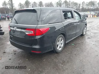 2019 Honda Odyssey EX-L with VIN 5FNRL6H76KB116195, listed as a IAAI auction lot 41078250 with 106,922 mi miles. Bid and sale history available at carsss.com. Image 4.