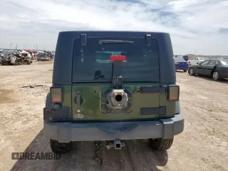 2008 Jeep Wrangler Unlimited X с VIN 1J4GA39128L537191, выставлен на аукционе Copart как лот 56844345 с пробегом 305 764 миль миль и Списание • Salvage title. История ставок и продаж доступна на DreamBid. Изображение 6.